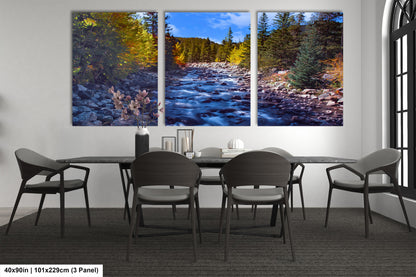 a dining room table with chairs and a painting on the wall