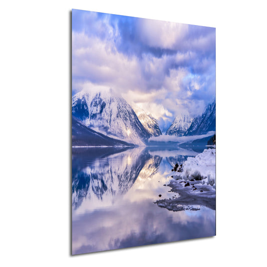 a picture of a mountain range with a lake in the foreground