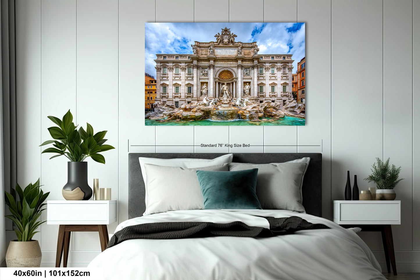 a bedroom with a bed and a painting on the wall
