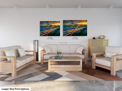 a living room filled with furniture and a painting on the wall