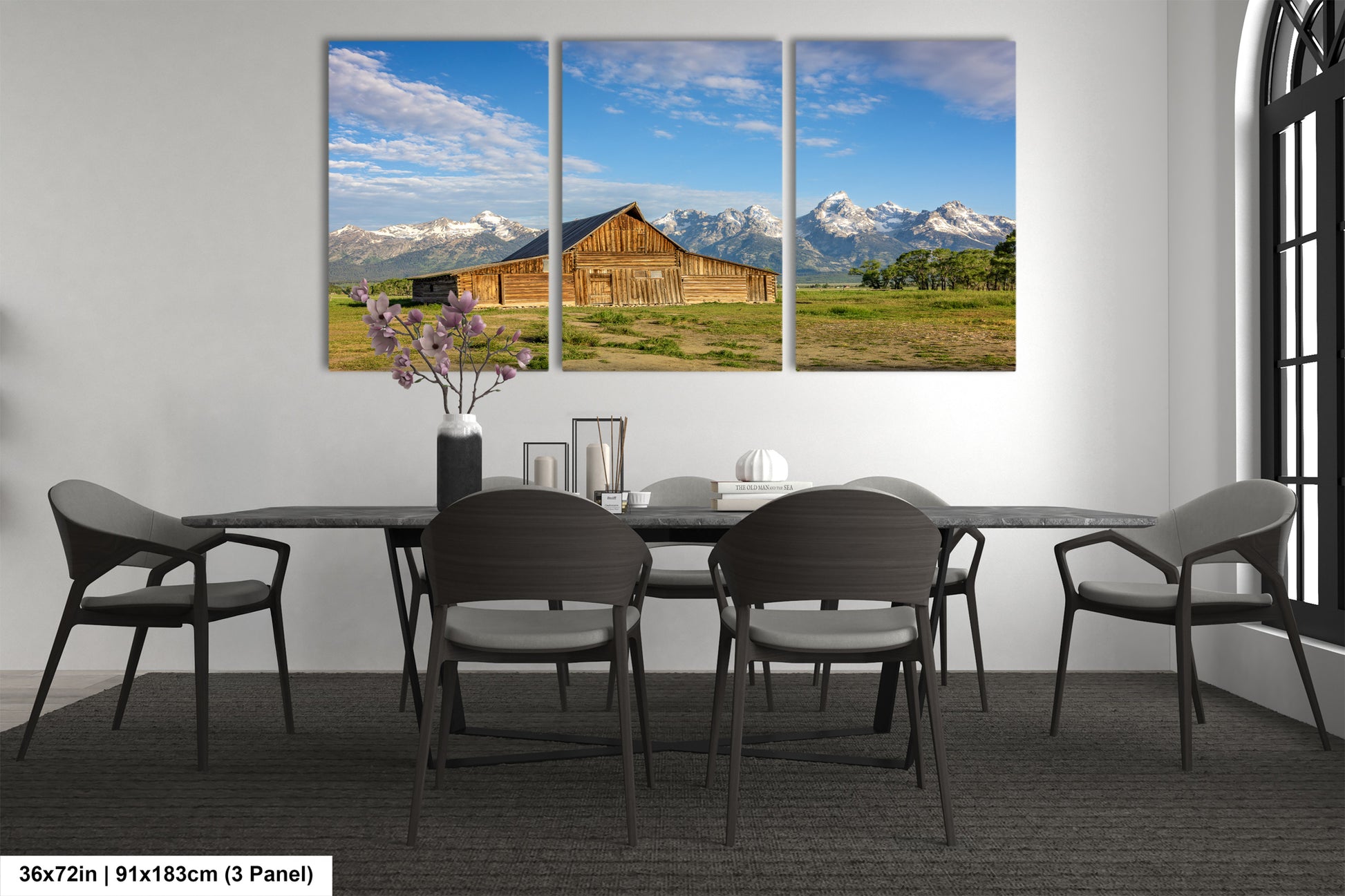 a dining room with a table and chairs