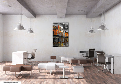 a room filled with lots of furniture and a painting on the wall