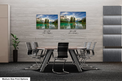 a dining room table with chairs and a picture of a lake
