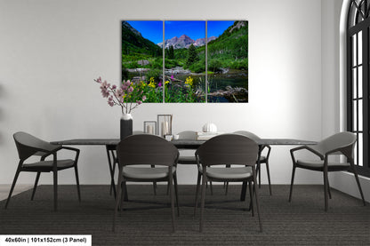 a dining room with a table and chairs