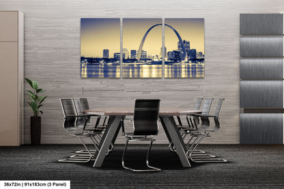 a dining room table with a view of the st louis skyline