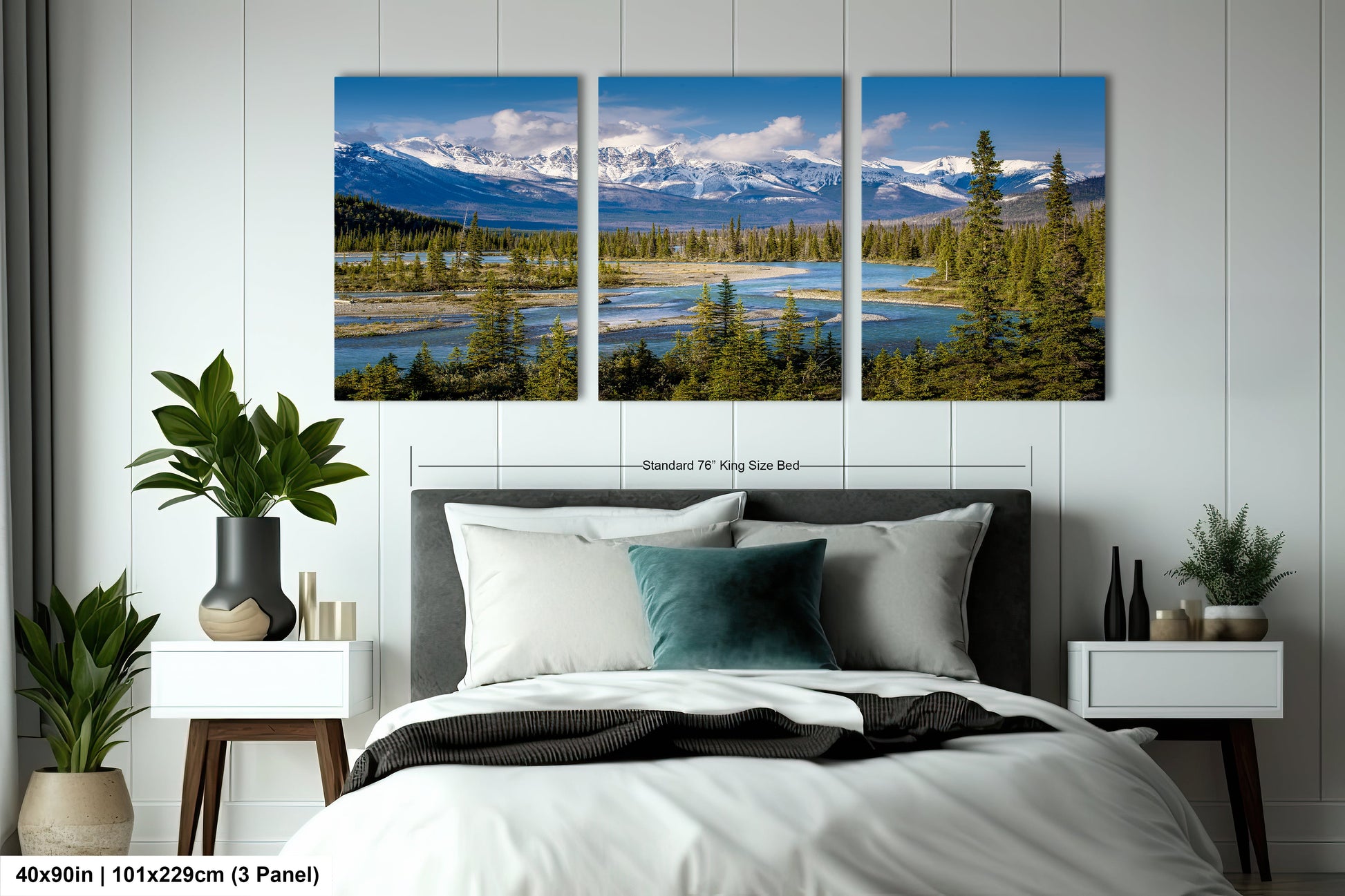 a bed room with a neatly made bed and three pictures on the wall