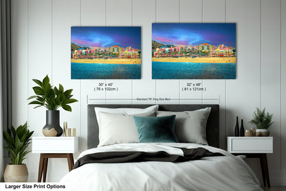a bedroom with a bed and two pictures on the wall