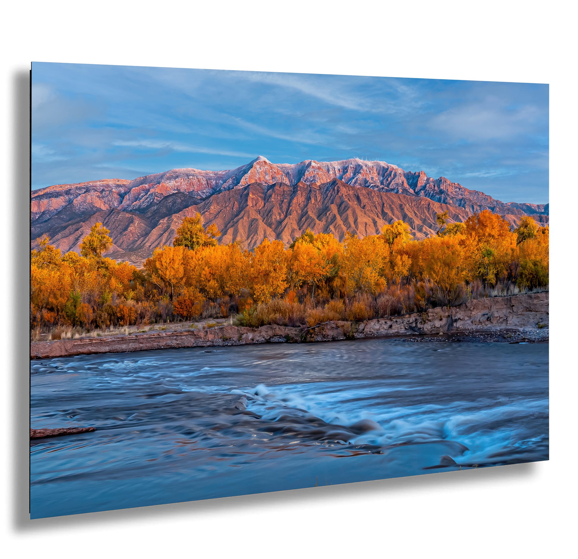a river with a mountain in the background