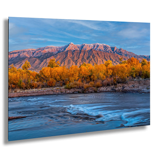 a river with a mountain in the background
