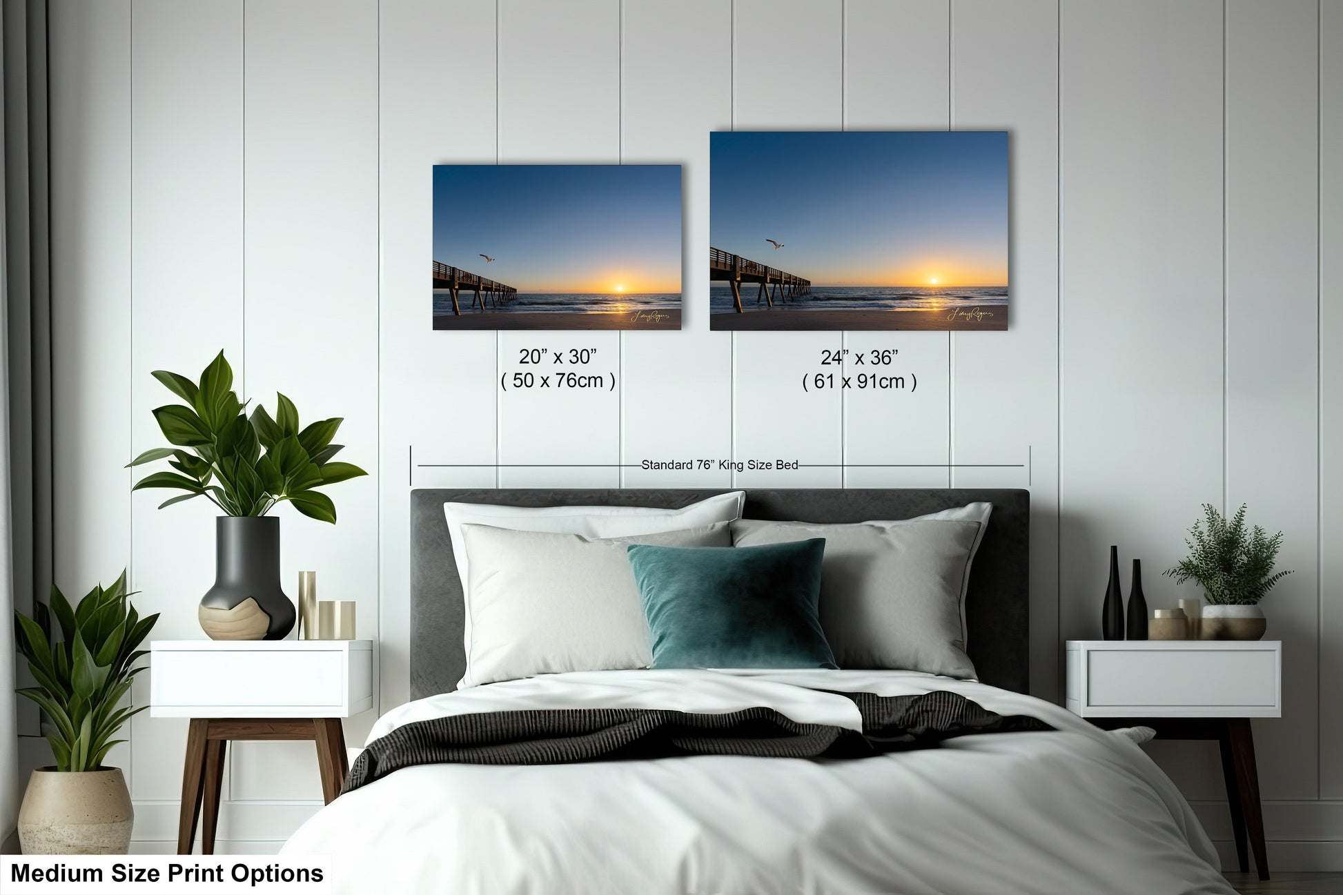 a bedroom with a bed and two pictures on the wall