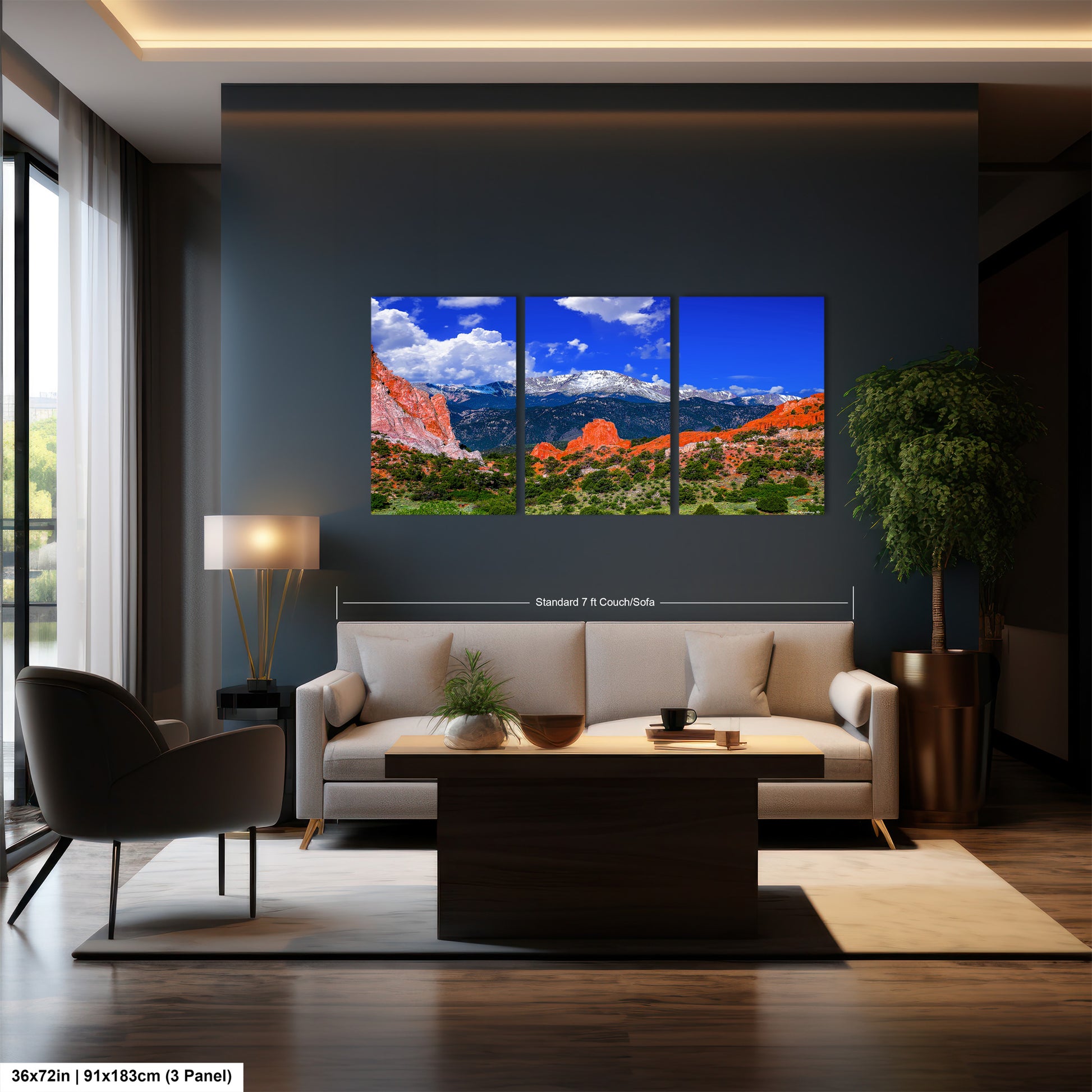 a living room filled with furniture and a painting on the wall