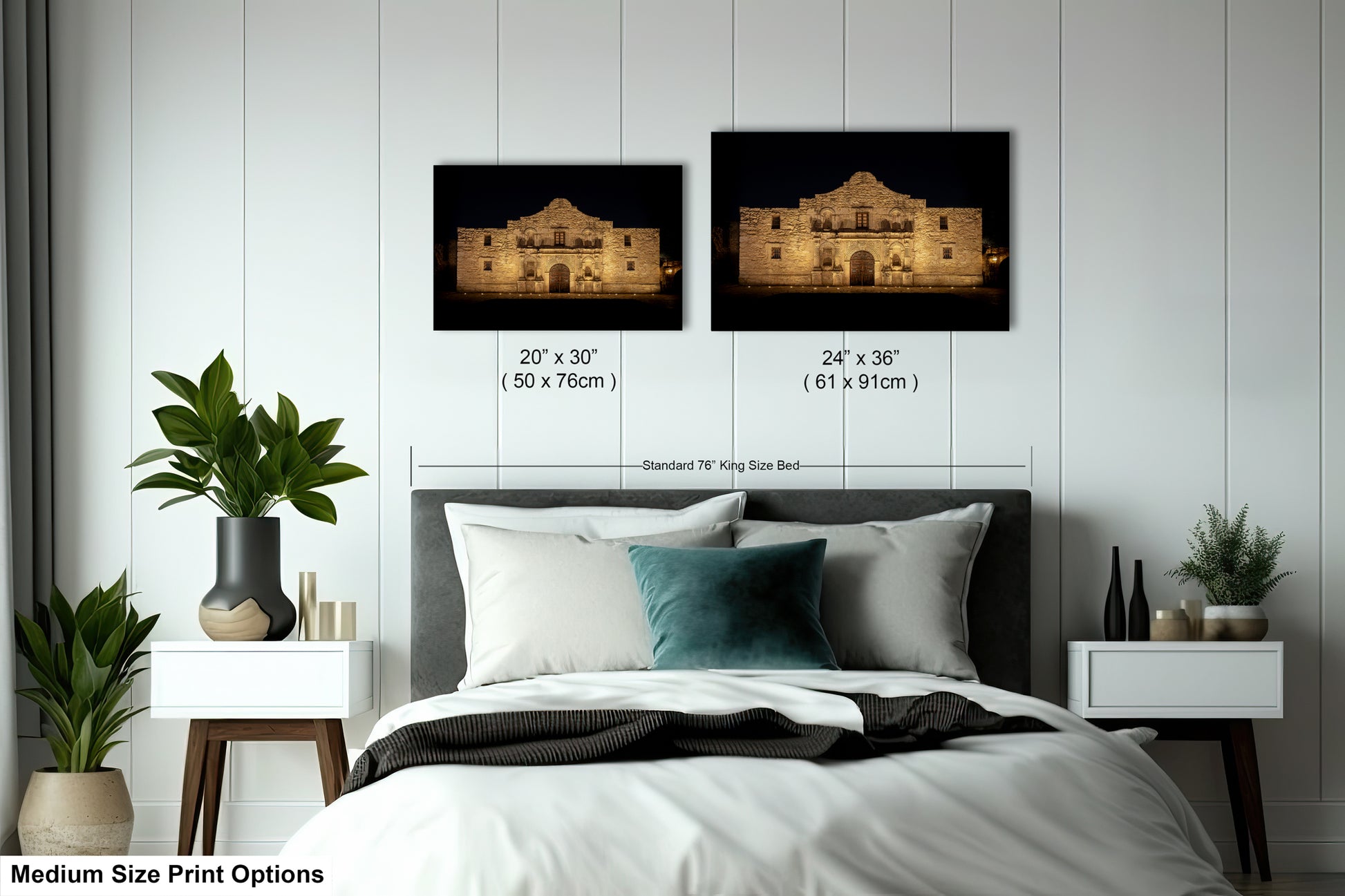 a bedroom with a bed, nightstands, and a large framed print of a building, likely a historical landmark, hanging on the wall above the bed.