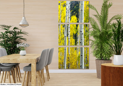 a room with a table, chairs and a painting on the wall