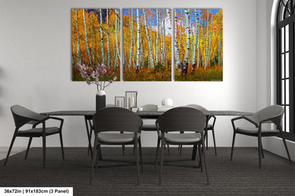 a dining room table with chairs and a painting on the wall