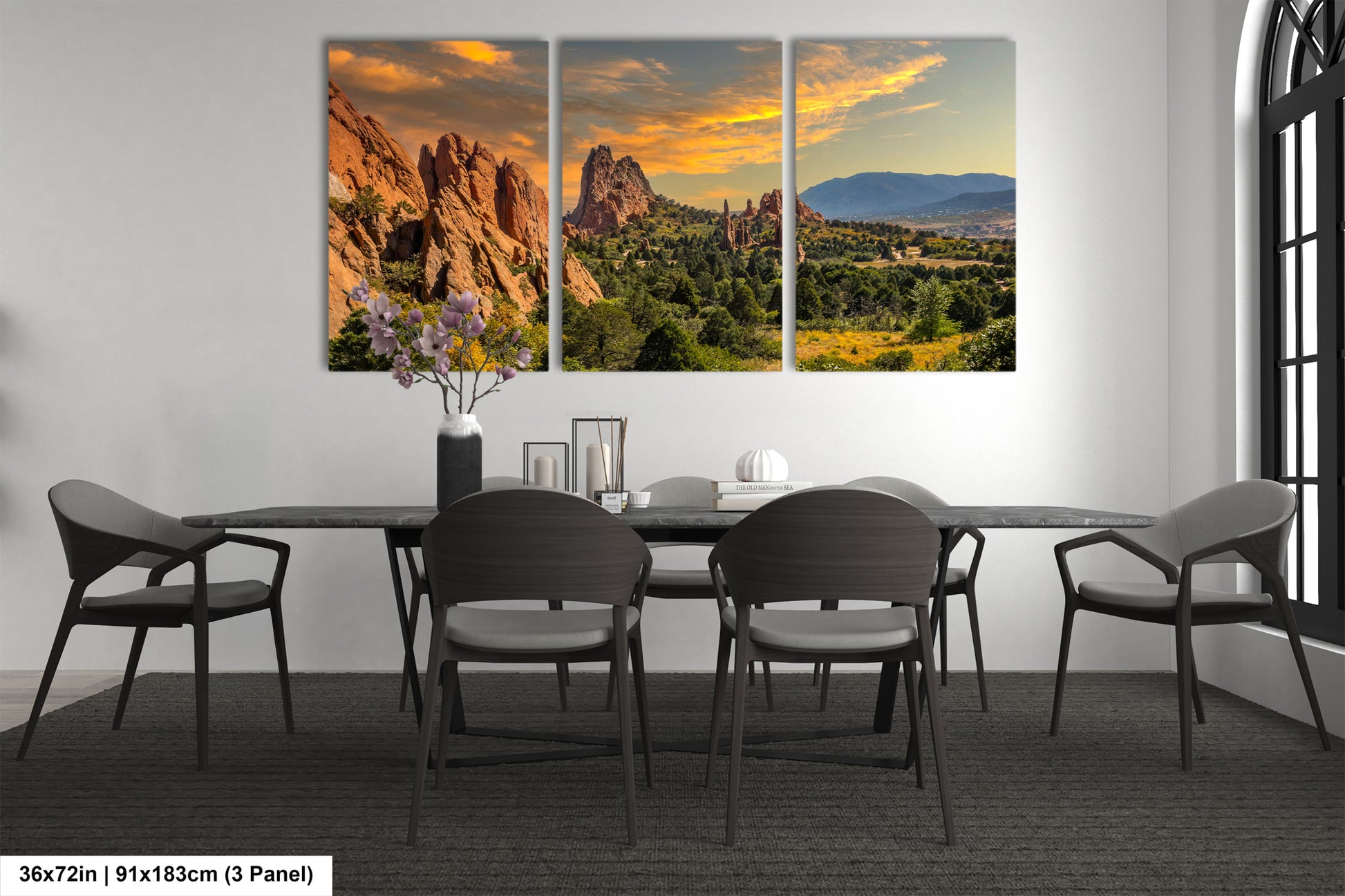 a dining room with a table and chairs