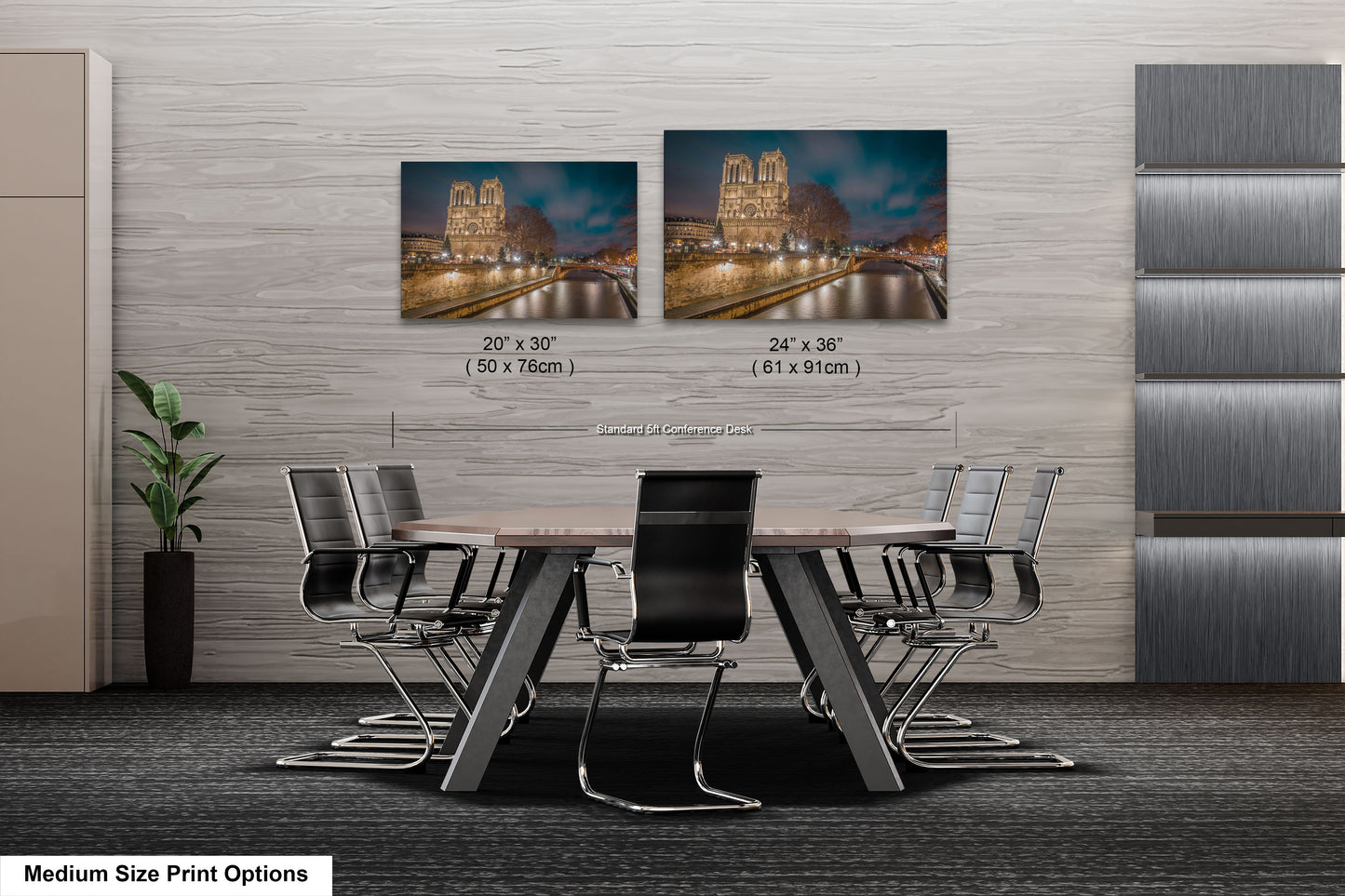 a dining room table with chairs and a picture on the wall