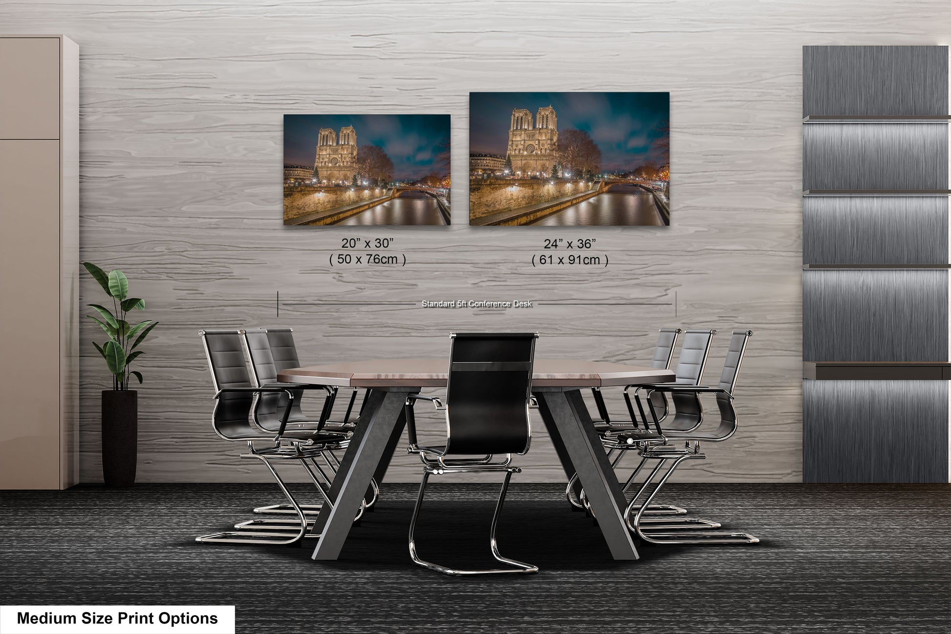 a dining room table with chairs and a picture on the wall
