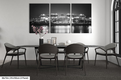a black and white photo of a dining room table
