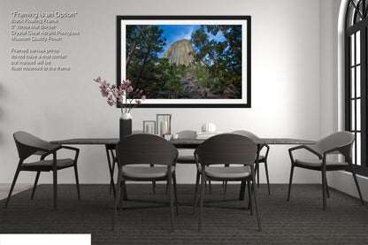a picture of a dining room with a table and chairs