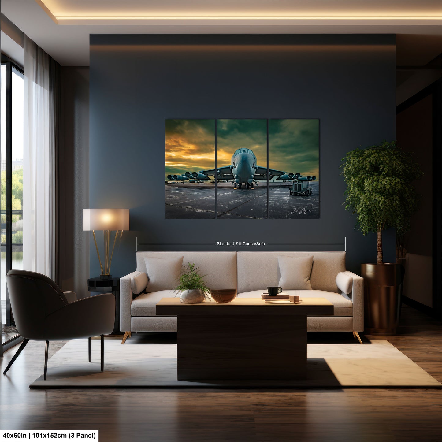 a living room filled with furniture and a painting on the wall