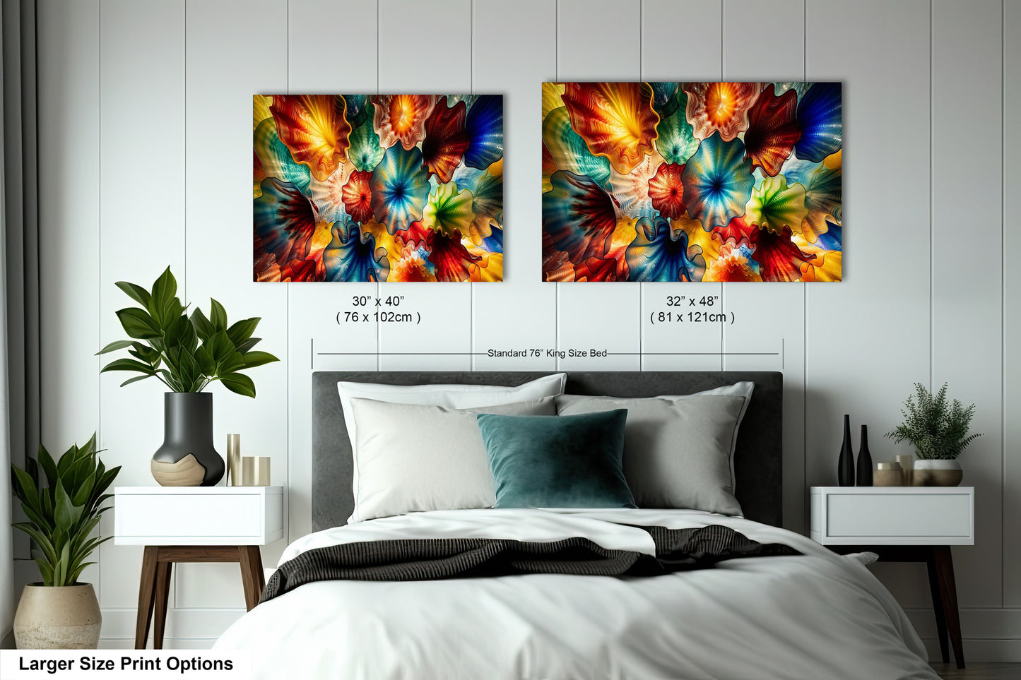 a bedroom with two large paintings of colorful flowers hanging on the wall above a bed. The paintings are approximately 30 inches wide and 32 inches tall.