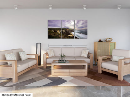 a living room filled with furniture and a painting on the wall