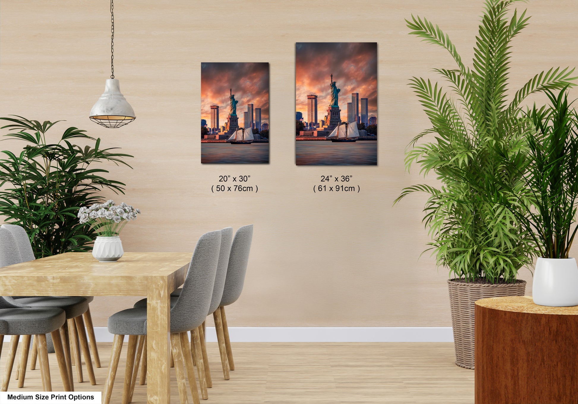 a room with a table and chairs and two pictures on the wall