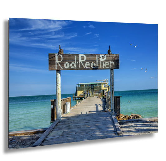 a wooden pier with a sign that says rod nether