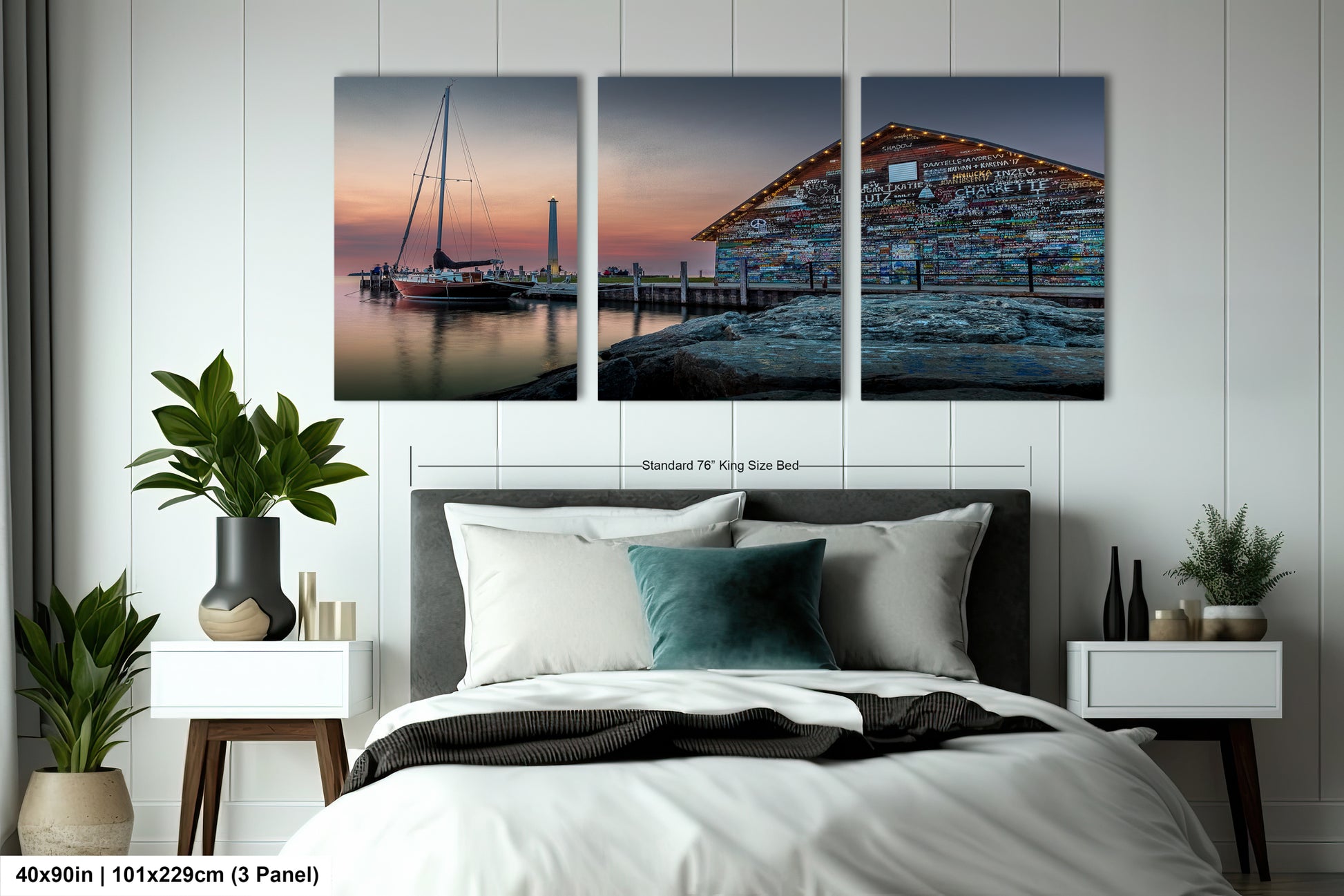 a modern office space with a large, three-panel artwork depicting a serene harbor scene at sunset. The artwork is mounted on a gray wall above a wooden table surrounded by black chairs. The overall design of the space is sleek and contemporary, with a neutral color palette and minimalist furniture.