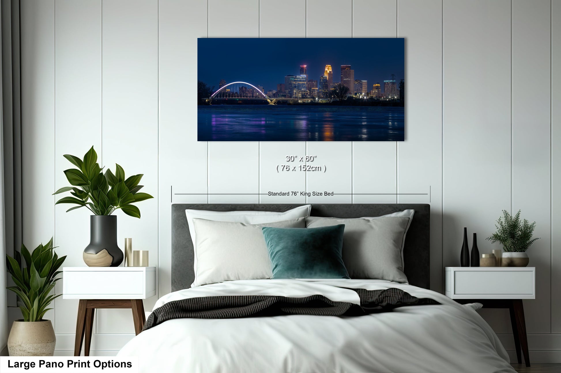 a bedroom with a large bed and a night view of a city