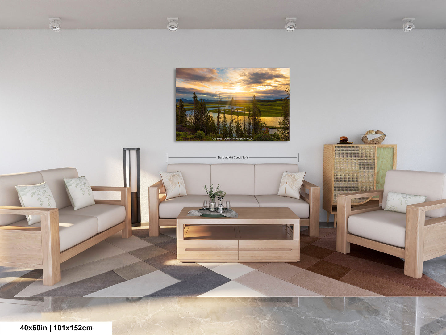 a living room filled with furniture and a painting on the wall