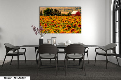 a room with a table and chairs and a painting on the wall