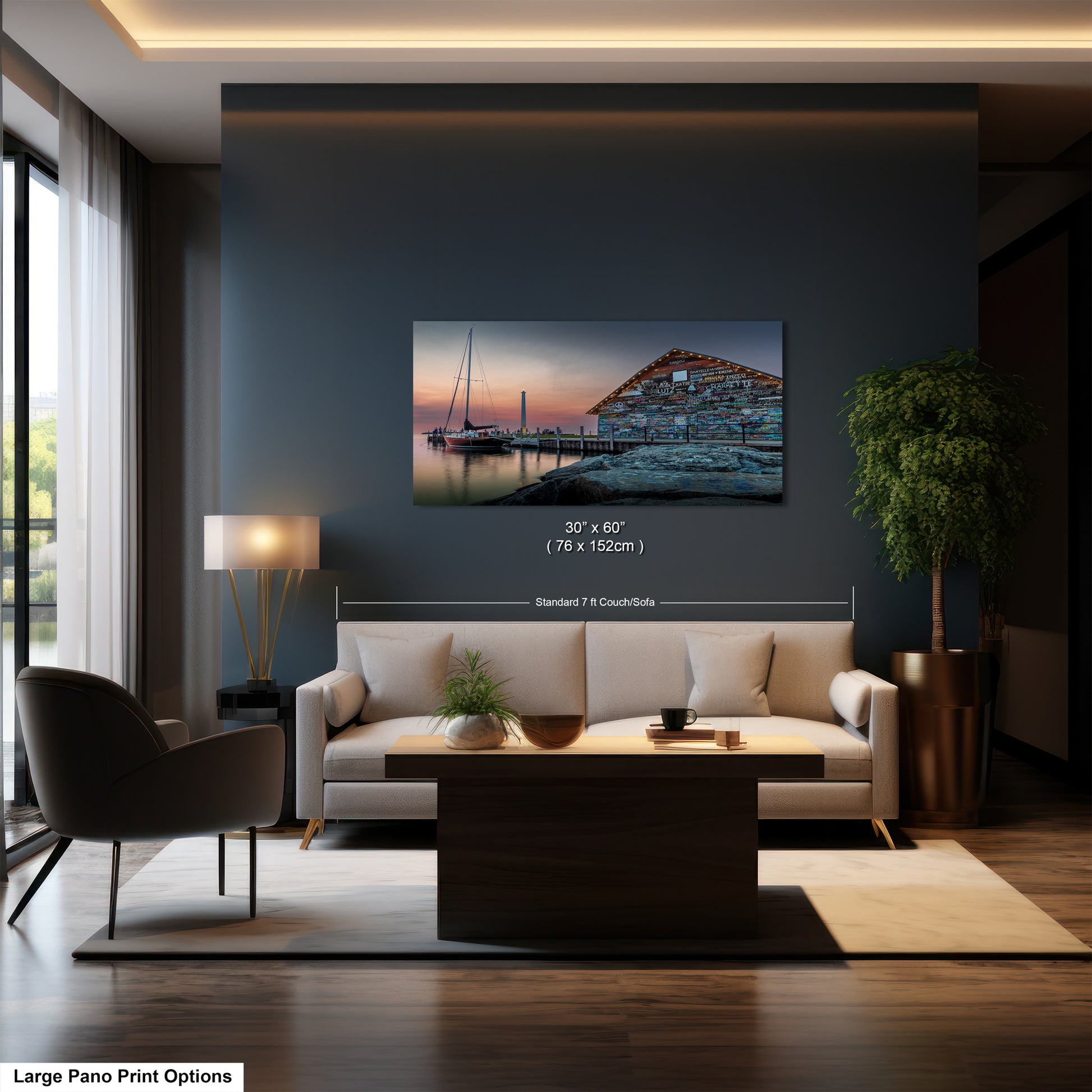 A large pano print depicting a serene harbor scene at sunset, with a wooden building and a dock in the background.