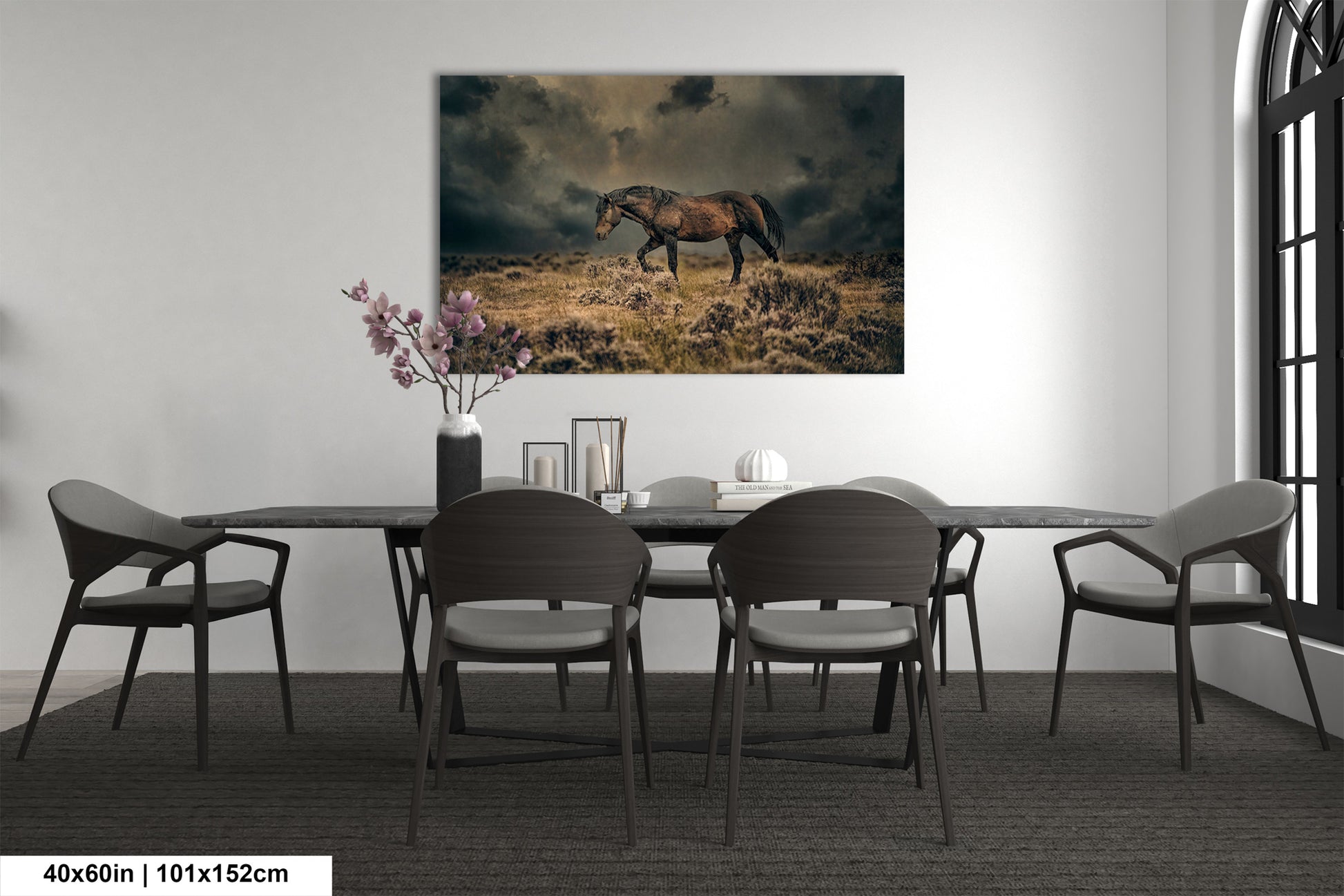 a dining room table with chairs and a painting of a horse on the wall