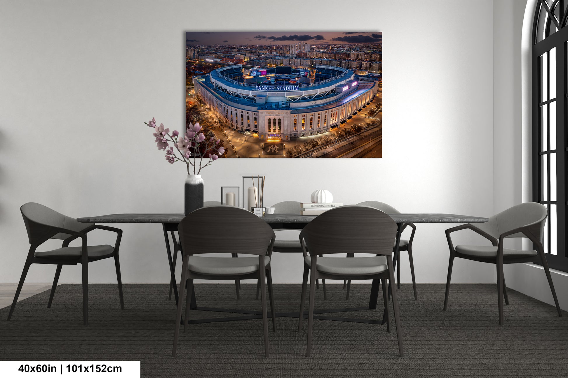a dining room with a table and chairs