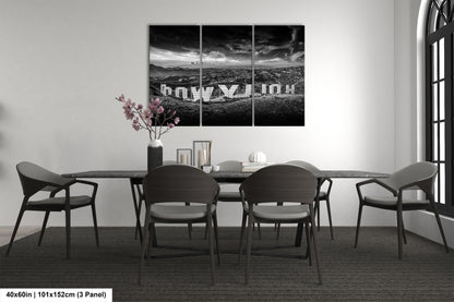 a black and white picture of a table and chairs