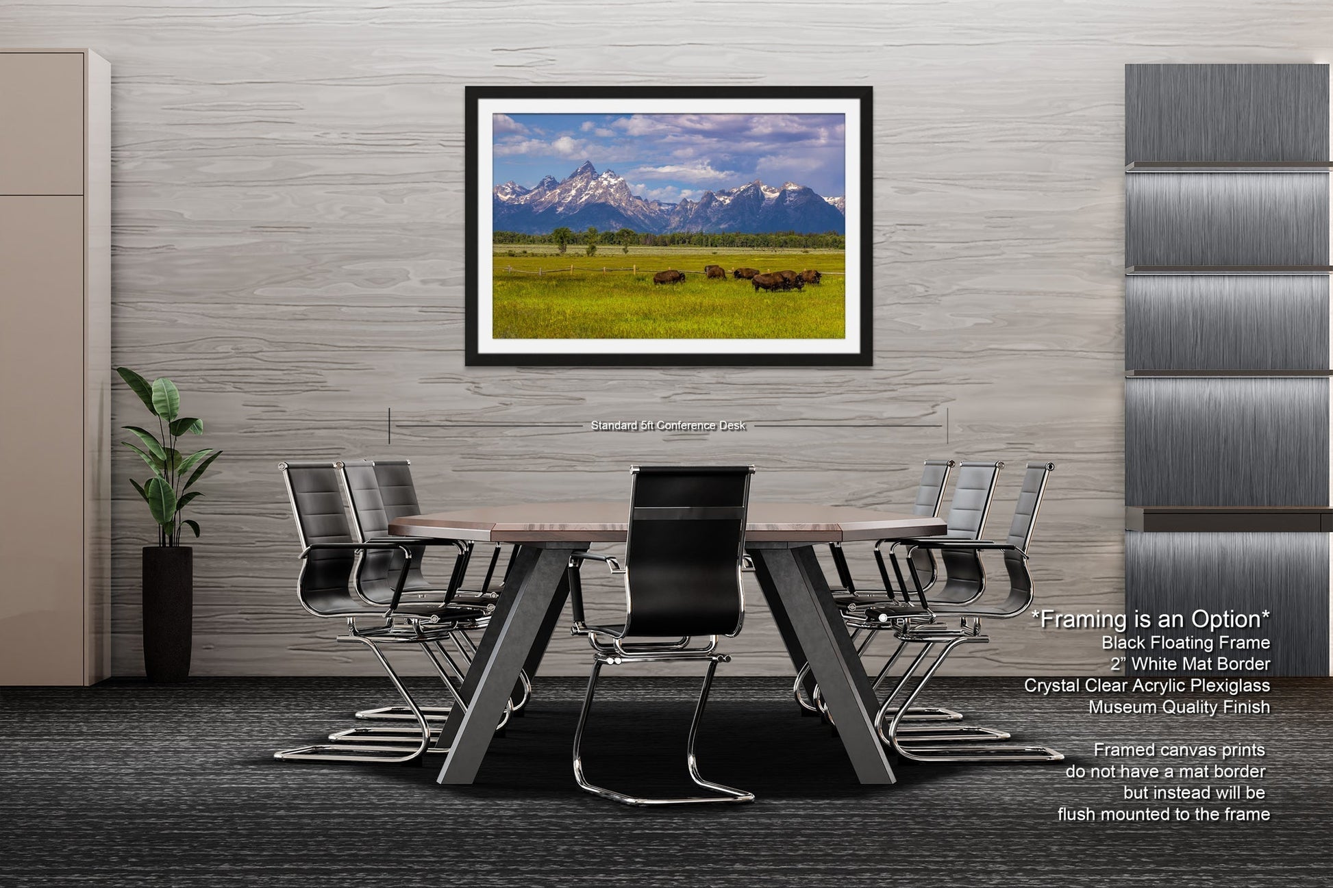 a dining room table with chairs and a picture hanging on the wall