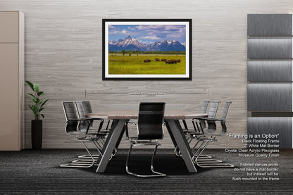 a dining room table with chairs and a picture hanging on the wall