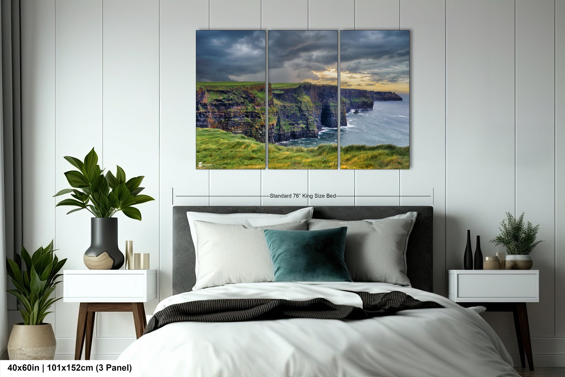 a bedroom with a large bed and a painting on the wall