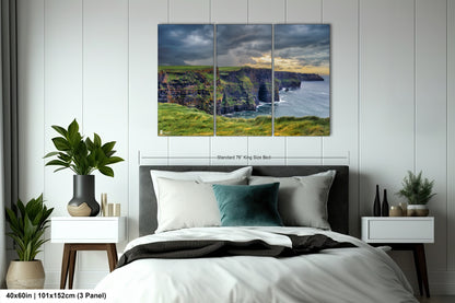 a bedroom with a large bed and a painting on the wall
