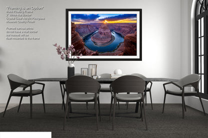 a picture of a dining room with a table and chairs