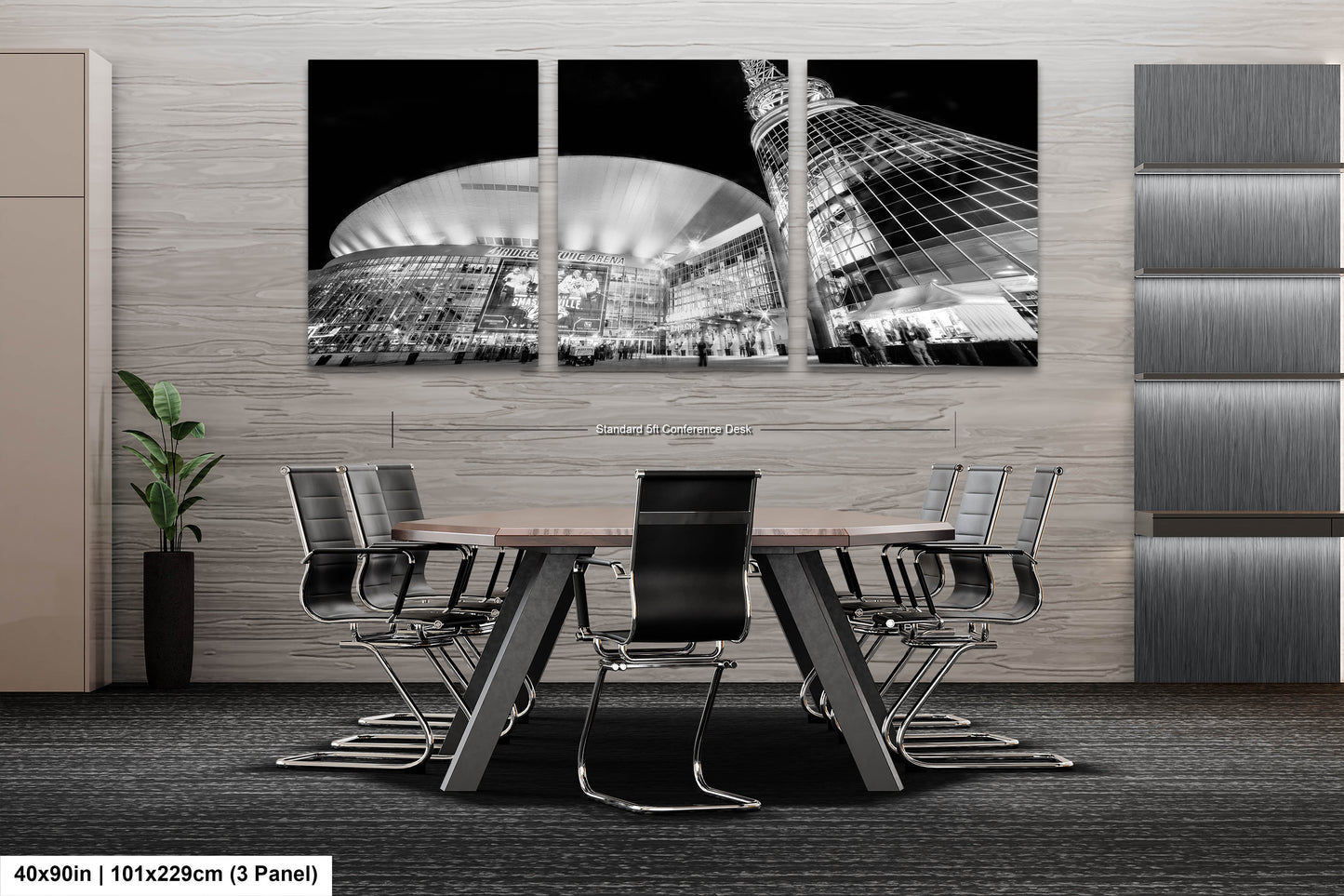 a black and white photo of a table and chairs