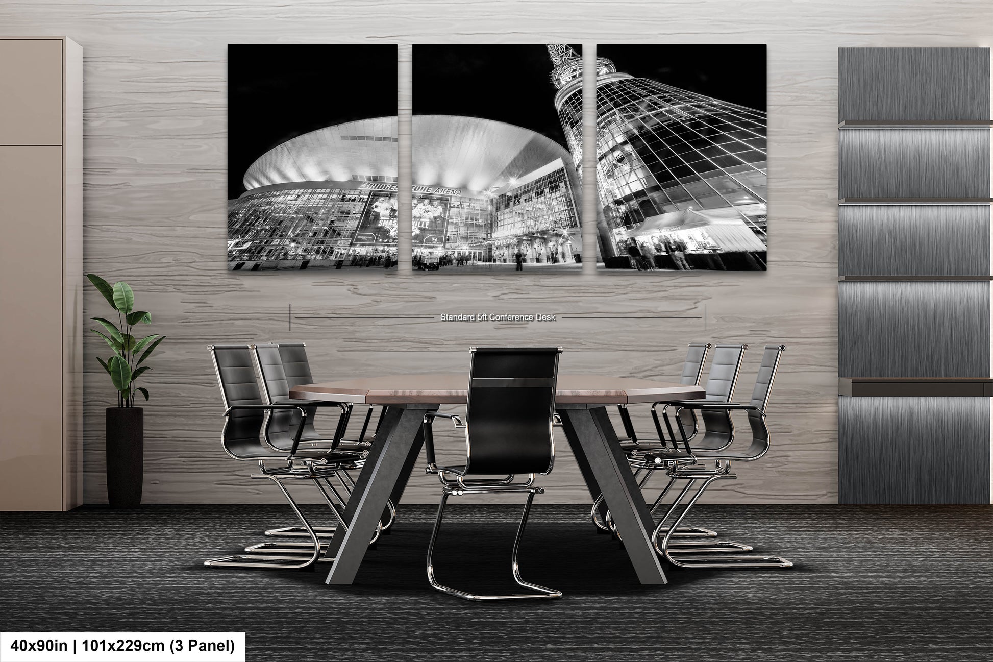 a black and white photo of a table and chairs