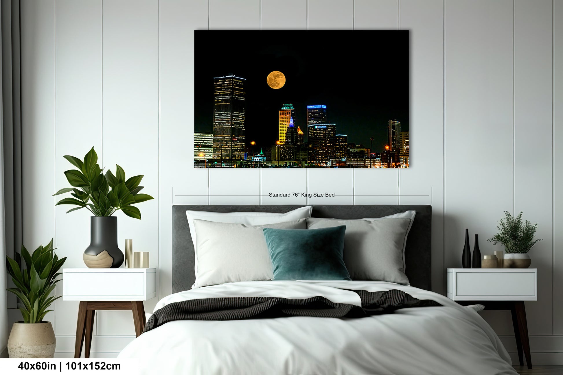 a bed in a room with a picture on the wall
