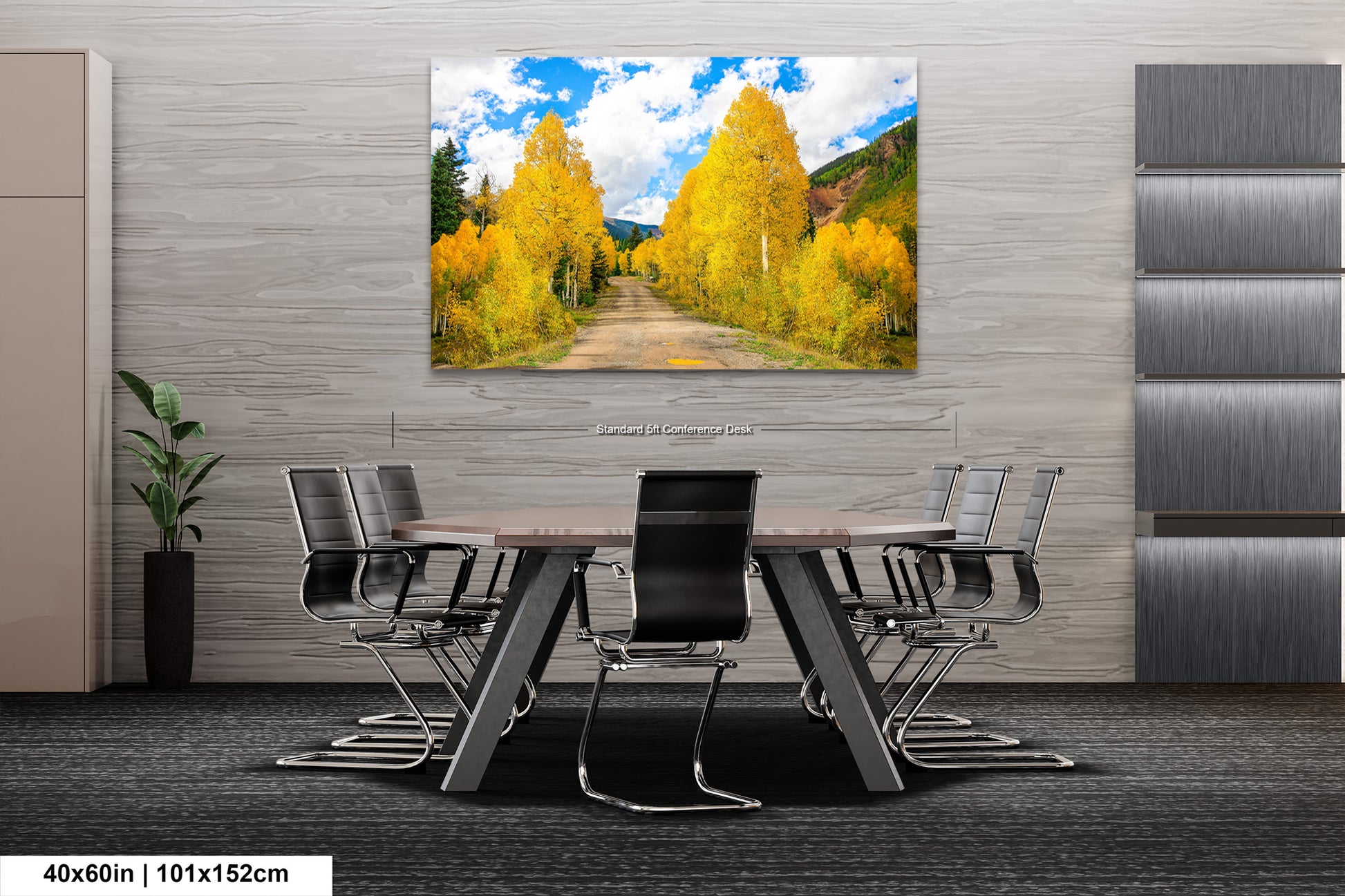 a dining room table with chairs and a painting on the wall