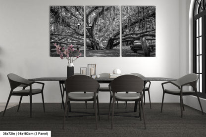 a black and white photo of a dining room table
