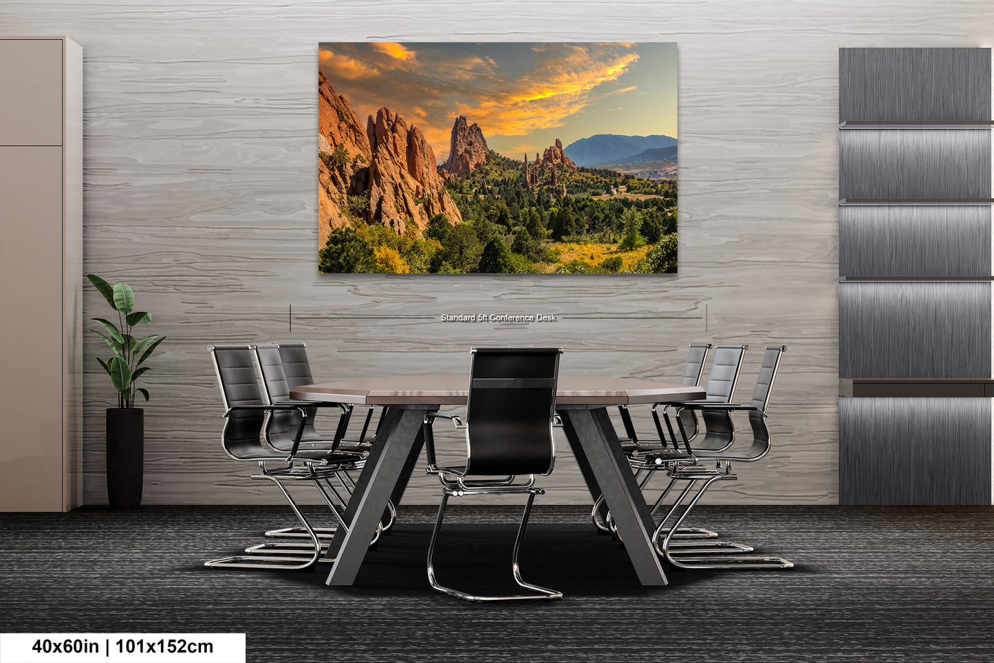 a dining room table with chairs and a painting on the wall