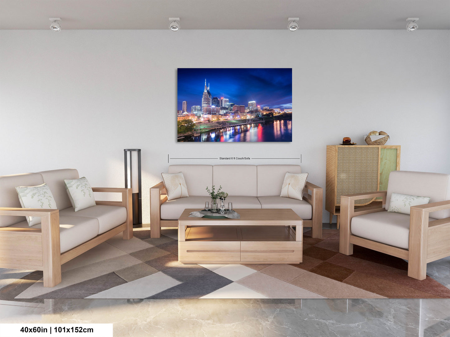 a living room filled with furniture and a painting on the wall