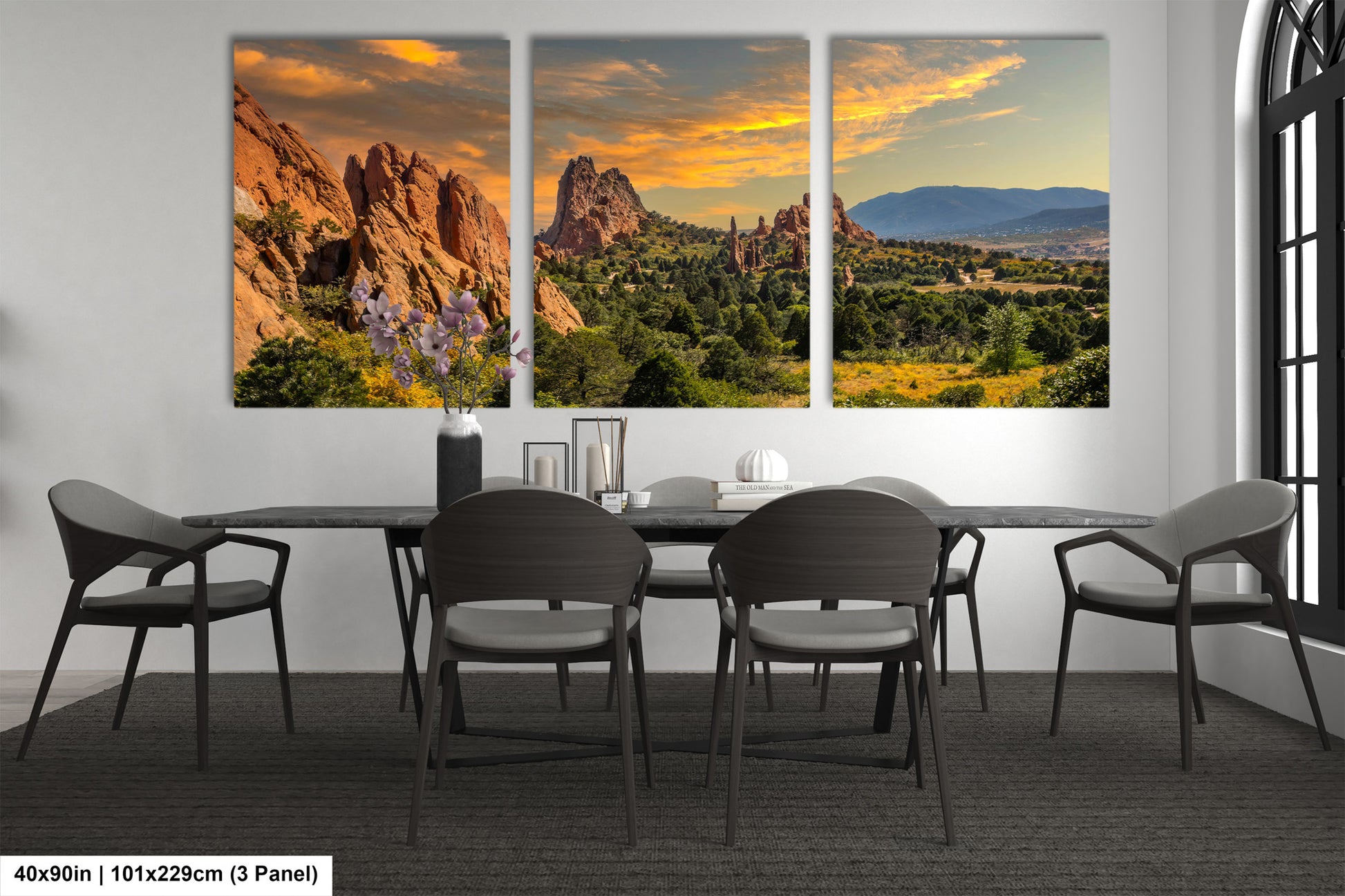 a dining room with a table and chairs