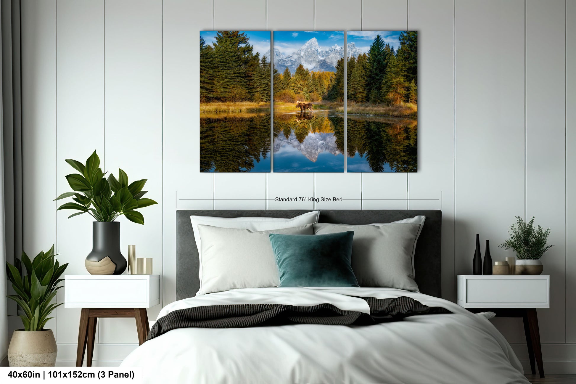 a bed room with a neatly made bed and a painting on the wall